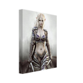 A vertical canvas wall art print featuring a fantasy elf woman with long platinum blonde hair, pointed ears, and ornate armor in purple, silver, and brown tones, shown at a slight angle on a white background.