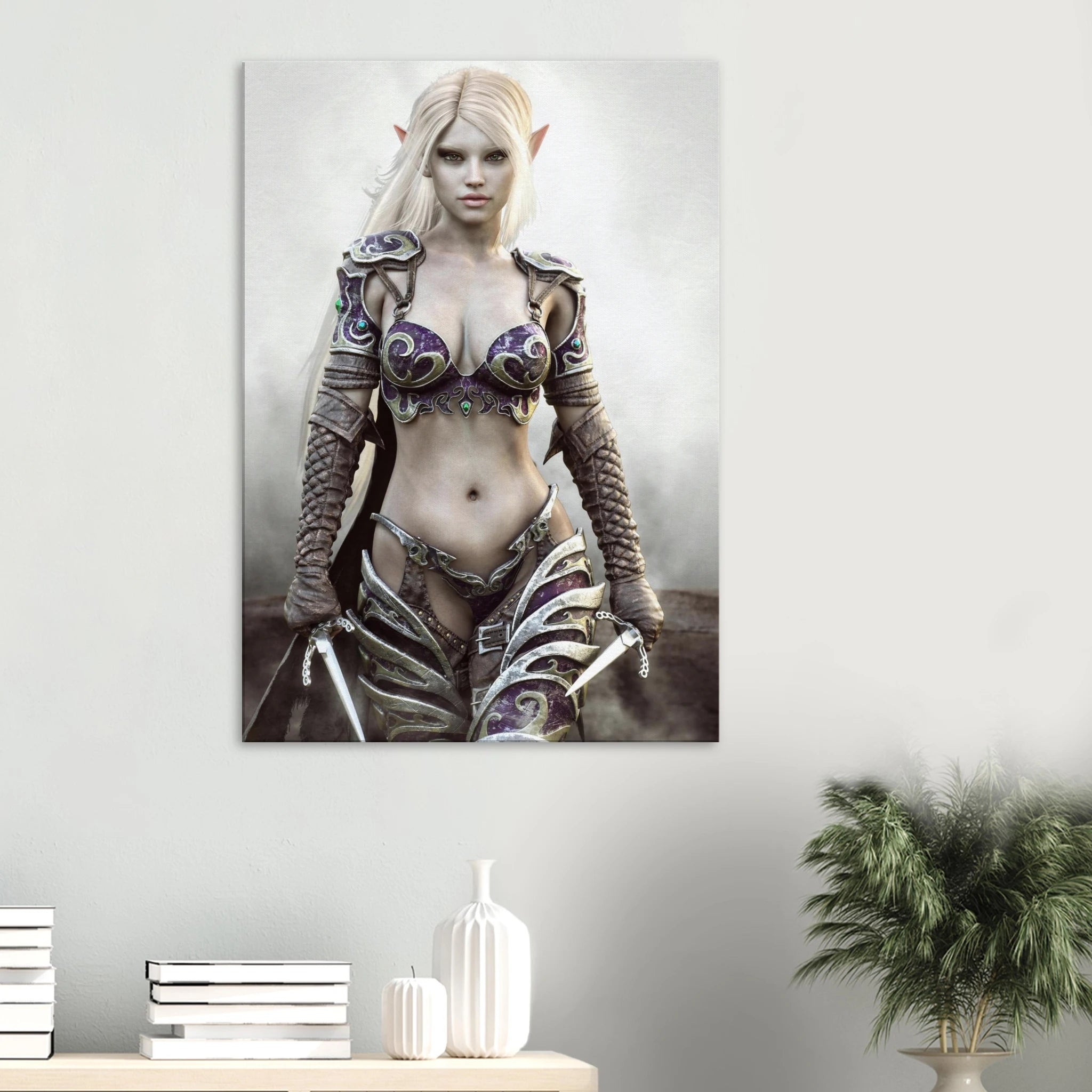 A vertical wall art print depicting an elf-like female warrior with pale skin, long white hair, pointed ears, and ornate armor, displayed on a light gray wall above a console table with books, a vase, and a potted plant.