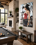 Female pirate fantasy wall art displayed in a bright upscale game room with pool table, fireplace and rustic wood furnishings.