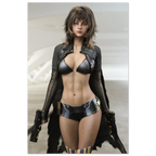 A fashion runway-style photo of a woman modeling a futuristic black outfit with a metallic black bra top, sheer black long sleeves, a black faux-leather vest, a black patterned mini skirt, and black thigh-high stockings, while holding two black pistols. The background is a clean, light gray runway setting.