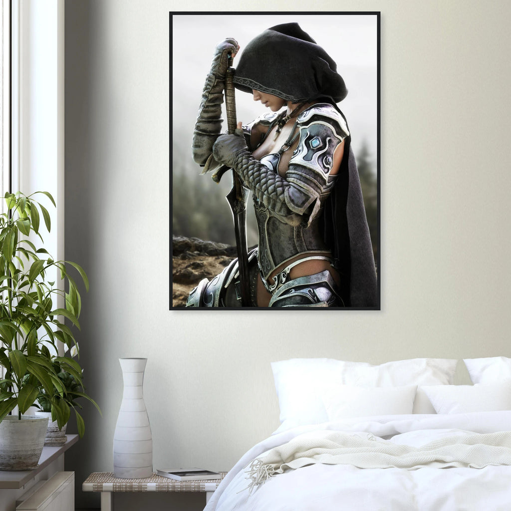 A framed wall art print depicting a hooded warrior in detailed silver and black armor holding a sword, displayed above a bed in a modern bedroom setting.