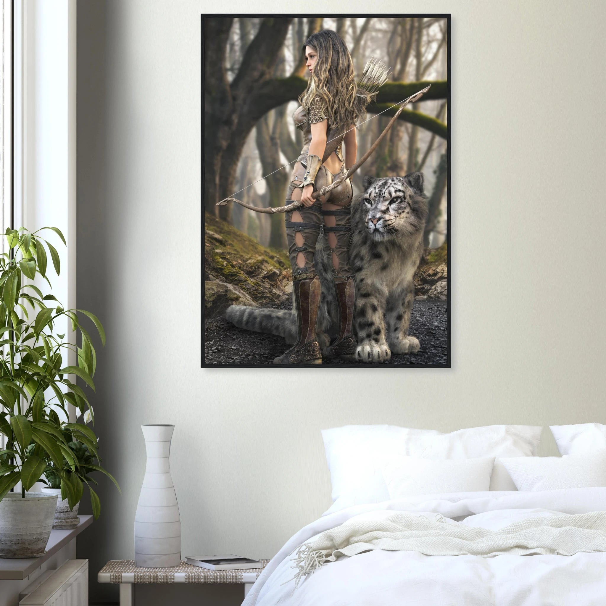 A framed vertical art print depicting a fantasy scene of a woman with a bow and a snow leopard in a misty forest, displayed on a bedroom wall above a bed.