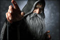 Mighty hooded wizard with long silver beard casting a spell in dark fantasy digital download artwork