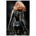 Handcrafted fantasy artwork depicting a highly skilled redheaded assassin viewed from behind as she walks through swirling smoke beneath dramatic overhead light. Wearing a sleek black tactical bodysuit with reinforced armor, twin shoulder-mounted blades, thigh holsters, and dual pistols held at her sides, she projects quiet confidence and deadly precision. Rich cinematic lighting highlights the realistic textures of her combat gear while the dark, atmospheric background emphasizes the mystery of a professio