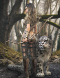 Female woodland archer with bow and leopard companion in a mystical forest fantasy scene